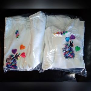 White sweat suit made for men or women so runs baggy. Custom made.